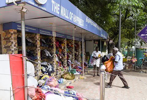 Clothes donated by the public find space in the Wall of Happiness in
Tiruchy, on Thursday.