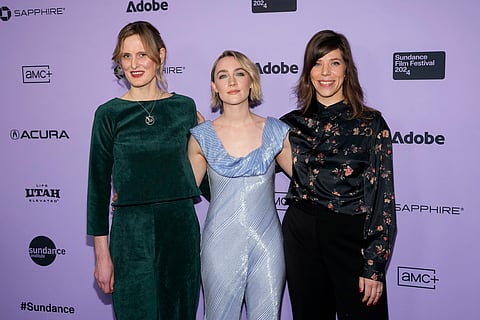 Amy Liptrot, from left, Saoirse Ronan and Nora Fingscheidt attend the premiere of "The Outrun" at the Library Center Theatre during the Sundance Film Festival on Friday, Jan. 19, 2024.