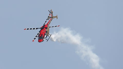 IAF's Sarang team performs during the second day of the Wings India 2024 international exhibition.