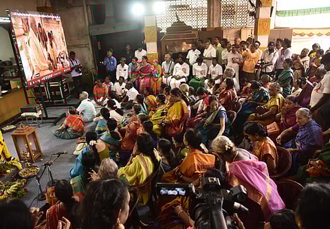 BJP President Annamalai along with local residents witnessing the live telecast of `Pran Prathista of Ram Lalla idol from Ayodhya, at Gopalapuram's Sri Venugopalaswamy Temple in Chennai on Monday.
