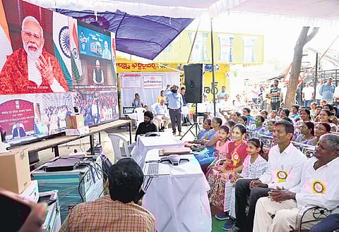 Software engineer-turned-farmer M Mallikarjun Reddy’s family interacts with Prime Minister Narendra Modi virtually during the Viksit Bharat Sankalp Yatra at Choppadandi in Karimnagar district on Thursday
