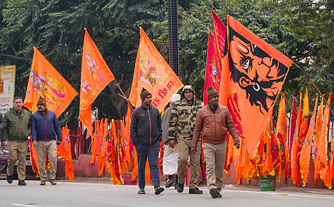 Religious flags on sale ahead of the consecration ceremony of Shri Ram Janmabhoomi Temple, in Ayodhya, Wednesday, Jan. 17, 2024.