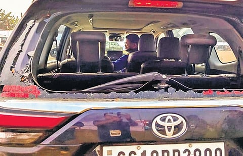 The broken rear windshield of Rahul’s car in Malda.