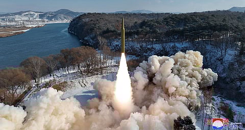 This photo provided by the North Korean government, shows what it says a flight test of a new solid-fuel intermediate-range in North Korea Sunday, Jan. 14, 2024.