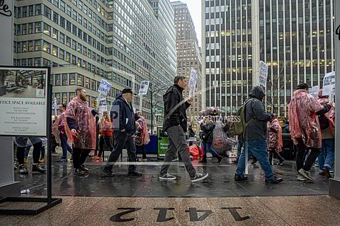 Daily News employees picket outside the newspaper's headquarters at 1412 Broadway, Thursday, Jan 25, 2024, in New York.