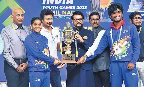 Union Minister Anurag Thakur and state minister Udayanidhi Stalin give away the champions trophy to Maharashtra players at the Khelo India Youth Games valedictory function, in Chennai on Wednesday.