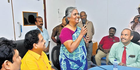 Pooranam works as a bank clerk in Madurai.
