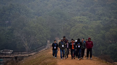 People take part in the Nature Trail as part of Ekamra Walks, at Chandaka forest on the outskirts of Bhubaneswar.