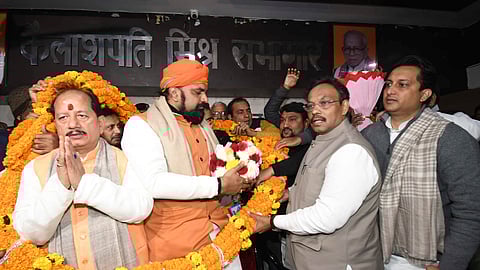 BJP National General Secretary Vinod Tawde with Bihar BJP President Samrat Choudhary (L) and party leader Vijay Kumar Sinha (R)
