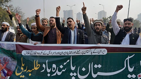 Members of Muslim Talba Mahaz Pakistan chant slogans at a demonstration to condemn Iran strike in the Pakistani border area, in Islamabad.