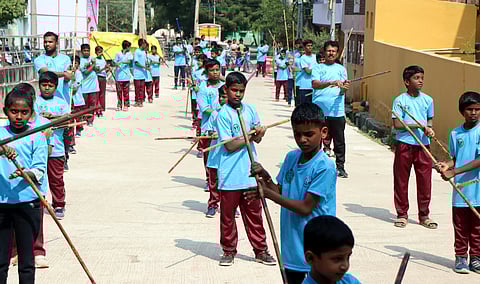 Students from the E V Silambam Academy participated in the Global World Record 2024 event held in Vellore on Sunday.
