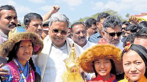 Tibetan children felicitate Chief Minister Siddaramaiah during his visit to Koppa, at the Bylakuppe Tibetan Settlement on Wednesday.