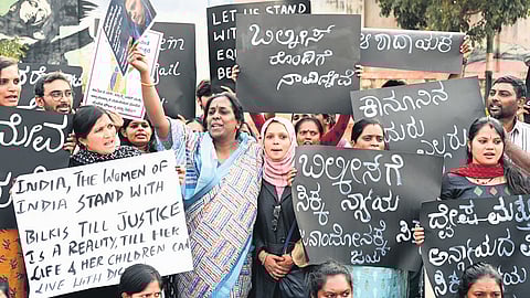 Members of various women’s organisations stage a protest seeking justice for Bilkis Bano, at Freedom Park in Bengaluru on Thursday.