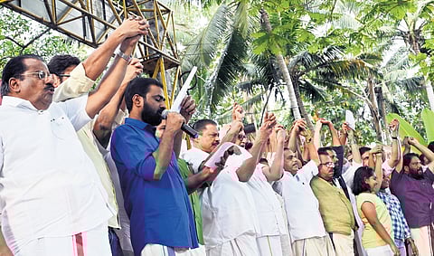 CPM leaders, including LDF convener E P Jayarajan, take part in the statewide human chain protest organised by the DYFI against the Centre’s neglect towards the state, at Keltron junction in Vellayambalam, Thiruvananthapuram, on Saturday. DYFI state secretary V K Sanoj is administering the pledge.