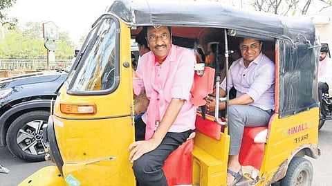 BRS working president KT Rama Rao takes an auto-rickshaw from Yusufguda to Telangana Bhavan on Friday, with party MLA M Gopinath sitting beside the driver