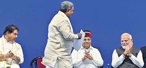Chief Minister Siddaramaiah gets ready to address the gathering at the Boeing India Engineering & Technology Center in Bengaluru on Friday.
