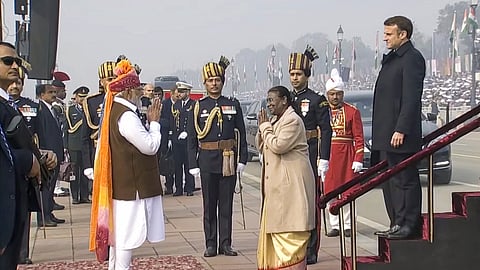 President Droupadi Murmu and chief guest French President Emmanuel Macron being received by Prime Minister Narendra Modi on their arrival during the 75th Republic Day celebrations at the Kartavyapath, in New Delhi, on Jan. 26, 2024.