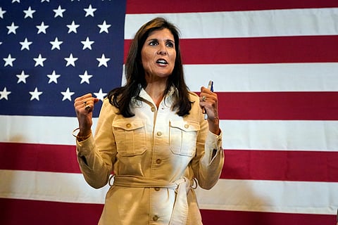 Republican presidential candidate former UN Ambassador Nikki Haley makes fists while greeting supporters following a campaign rally, Wednesday, Jan. 17, 2024, in Rochester, N.H.