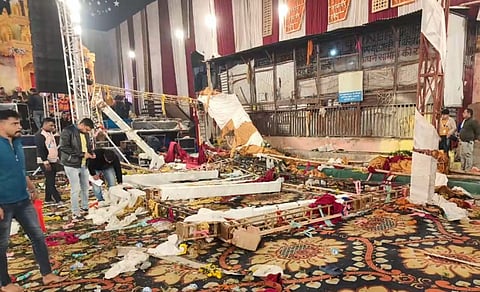 A collapsed stage at Kalkaji Mandir, in New Delhi, Saturday night, Jan. 27, 2024.