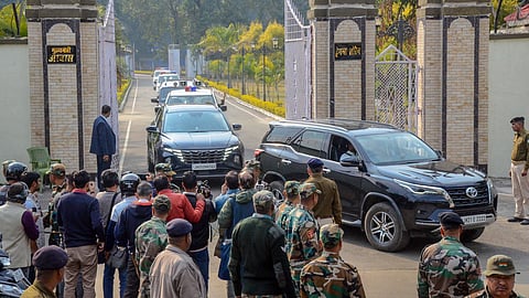 Vehicles of Jharkhand ministers and ruling MLAs come out from the Jharkhand Chief Minister Hemant Soren's residence after UPA's meeting, in Ranchi, Tuesday.