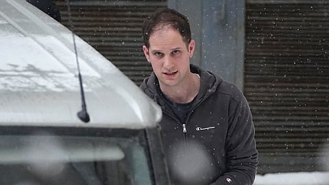 Wall Street Journal reporter Evan Gershkovich is escorted from the Lefortovsky court in Moscow.