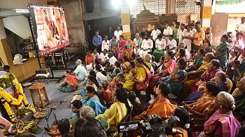 BJP President Annamalai along with oical residents witnessing the live telecast of the `Pran Prathista of idol of Ram Lalla from Ayodhya, at Sri Venugopalaswamy Temple at Gopalapuram in chennai on Monday.
