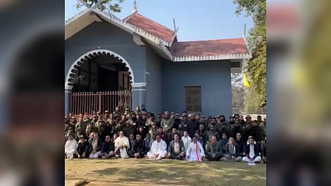 Meitei legislators with members of the radical Meitei organisation 'Arambai Tenggol' at the Kangla Fort in Imphal on Wednesday.