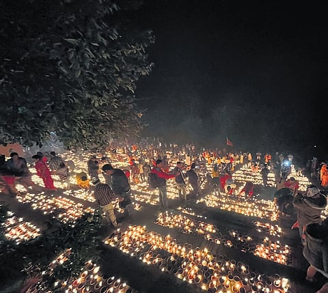 Lakhs of diyas light up Ayodhya Sarovar Ghat near Marwaripara in Sambalpur.