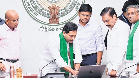 CM Jagan virtually releases aid to farmers under Rythu Bharosa.