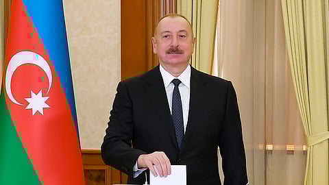 Azerbaijan President Ilham Aliyev casts his ballot during the presidential election at a polling station in Khankendi, Karabakh region, Azerbaijan, Wednesday, Feb. 7, 2024.