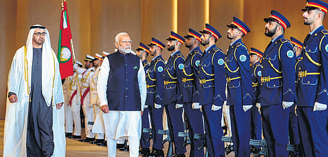 PM Narendra Modi, with UAE President Mohamed bin Zayed Al Nahyan, inspects a Guard of Honour upon his arrival in UAE.