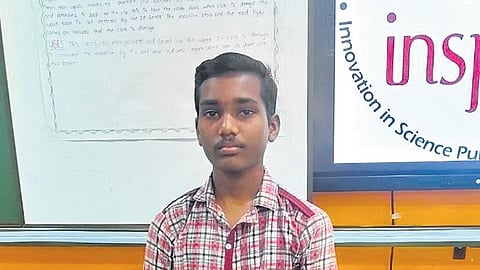 Jakkani Hemanth displays his
cloth-folding machine in Sircilla