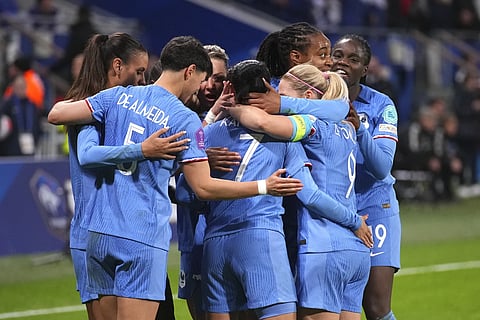 France's players celebrate after Sakina Karchaoui scored her side's second goal in the Women's Nations League semi-final match against Germany, Feb 23, 2024.