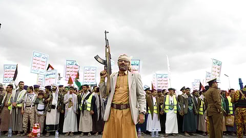 Houthi supporters attend a rally against the U.S.-led airstrikes on Yemen and in support of the Palestinians in the Gaza Strip on Yemen, in Sanaa, Yemen, Friday, Feb. 09, 2024.