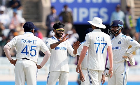 Ravindra Jadeja celebrates the wicket of England's batter Ollie Robinson during the second day of the fourth Test cricket match between India and England, in Ranchi