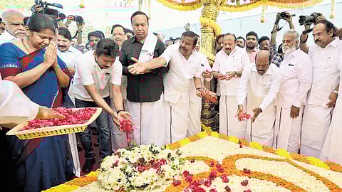 DMK leaders paying homage to party founder CN Annadurai at his memorial in Chennai on Saturday.