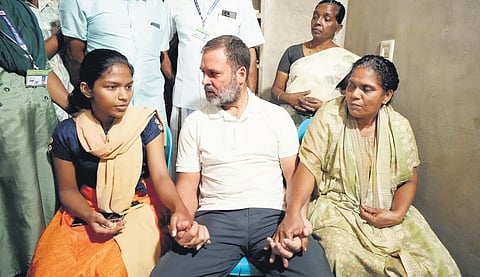 Rahul Gandhi with the victim's family.