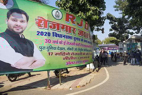 Media persons outside former deputy CM of Bihar & RJD leader Tejashwi Yadav's residence where RJD MLAs are staying ahead of the floor test of Bihar CM Nitish Kumar-led government, in Patna.