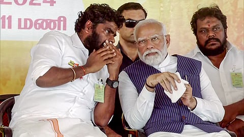 Prime Minister Narendra Modi with Tamil Nadu Bharatiya Janata Party (BJP) President K Annamalai during the public meeting, in Tirunelveli on Wednesday.