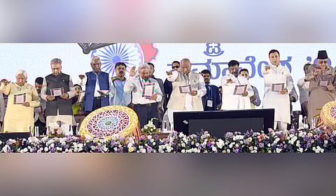 Leaders of I.N.D.I.A bloc including AICC chief Mallikarjun Kharge take oath at the ‘Constitution and National Unity’ conference at Palace Grounds in Bengaluru on Sunday.