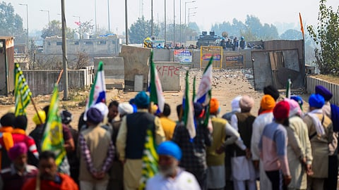 FILE: Farmers protest at the Punjab-Haryana Shambhu border during their 'Delhi Chalo' march, near Patiala district, Saturday, Feb. 17, 2024.