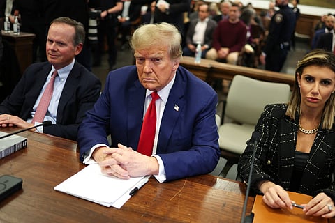 Former US President Donald Trump sits in New York State Supreme Court during the civil fraud trial against the Trump Organization, in New York City.