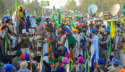 Farmers gather at the Punjab-Haryana Shambhu border during their protest march, near Ambala, Thursday, Feb. 15, 2024.