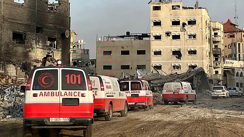 This handout photograph by the World Health Organization (WHO), shows a convoy of ambulances during a WHO, UN humanitarian agency OCHA and Palestinian Red Crescent mission to evacuate patients from Nasser hospital in Khan Yunis in the southern Gaza Strip, amid ongoing fighting between Israel and the Palestinian militant group Hamas.