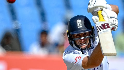 England's Joe Root plays a shot during the fourth day of the third Test cricket match between India and England at the Niranjan Shah Stadium in Rajkot on February 18, 2024.