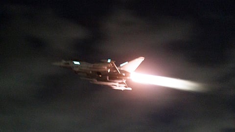 In this image provided the Ministry of Defence, an RAF Typhoon aircraft takes off to conduct further strikes against Houthi military targets in Yemen, from RAF Akrotiri, Cyprus.