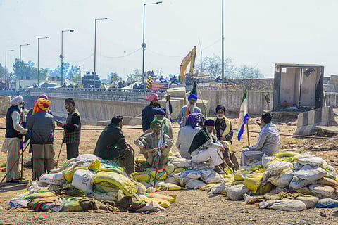 Farmers during their 'Black Day' protest at the Punjab-Haryana Shambhu border, in Patiala district, Friday, Feb. 23, 2024.