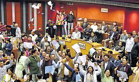 BJP councillors shouting slogans during the special session on the budget at MCD House on Tuesday. | Parveen Negi