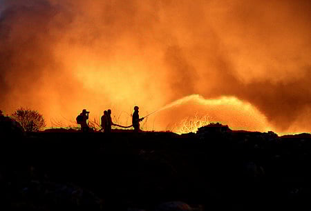 Fire and Rescue Services personnel dousing the massive blaze that broke out at Brahmapuram waste treatment plant.