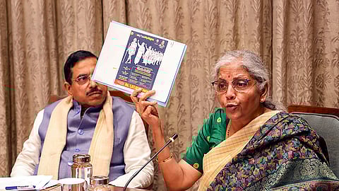 Finance Minister Nirmala Sitharaman with Union Minister of Parliamentary Affairs Pralhad Joshi during a press conference, in New Delhi.
